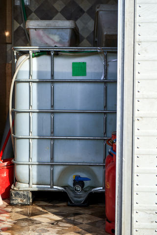 Drinking water supplied by a NGO in informal refugee camp. Subotica, Serbia